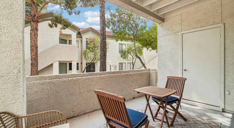 chairs and a small table on a patio