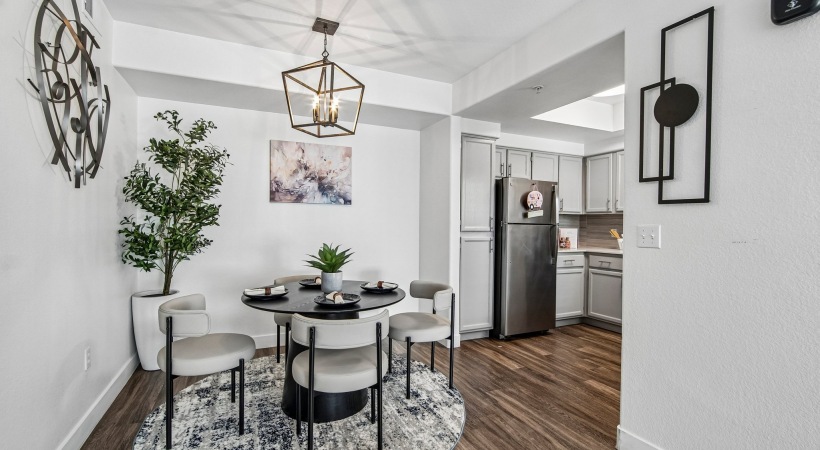 a spacious dining lounge near a kitchen