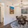 a dining room with a rug and a table