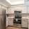 a kitchen with white cabinets