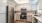 a kitchen with white cabinets
