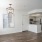 a kitchen with white walls